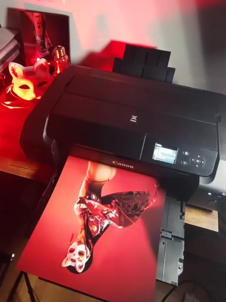 Canon photographic printer producing a SIBABES studio portrait